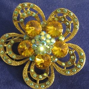 Dramatic marigold and aqua brooch pin